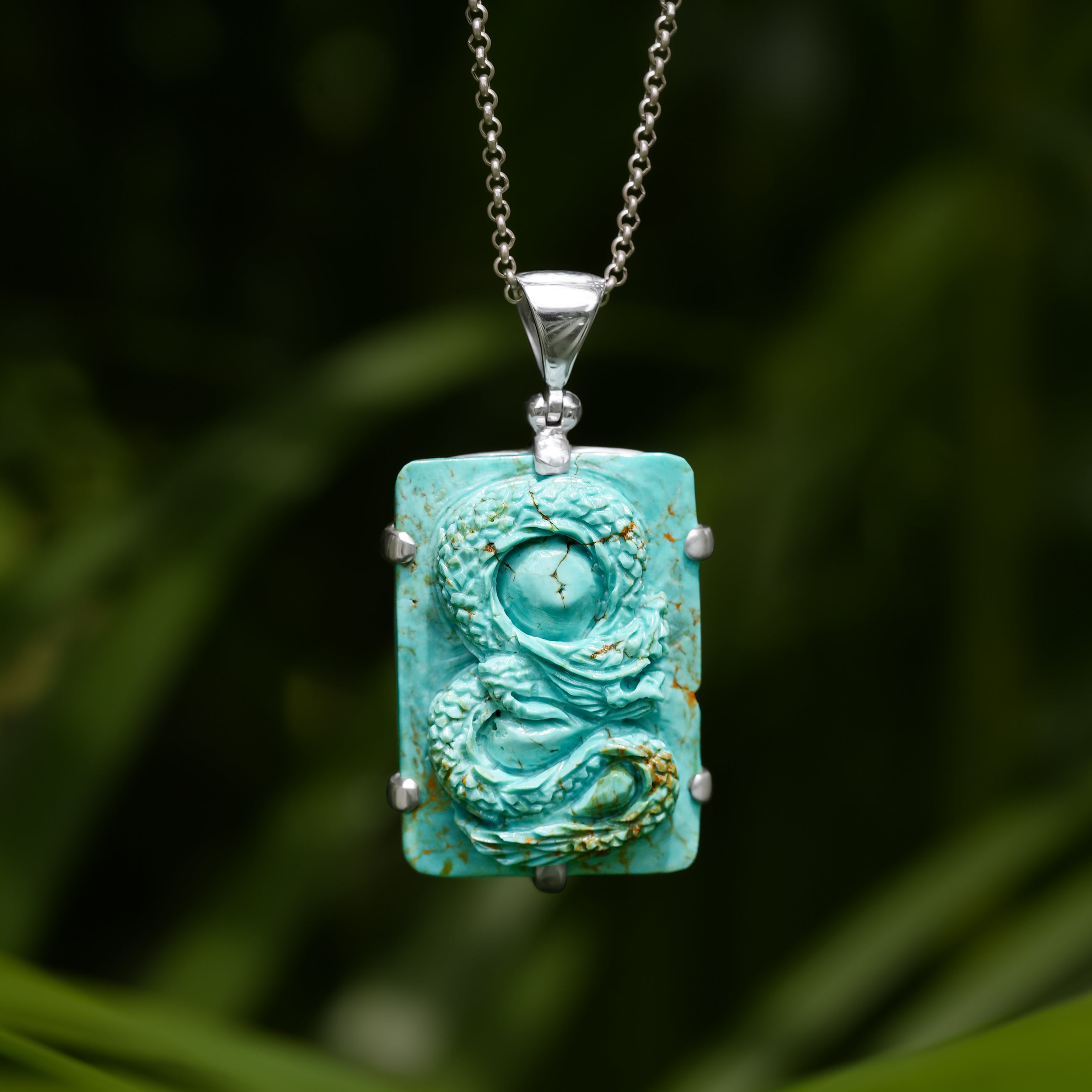 Starborn Carved Campitos Turquoise Dragon Pendant in Sterling Silver